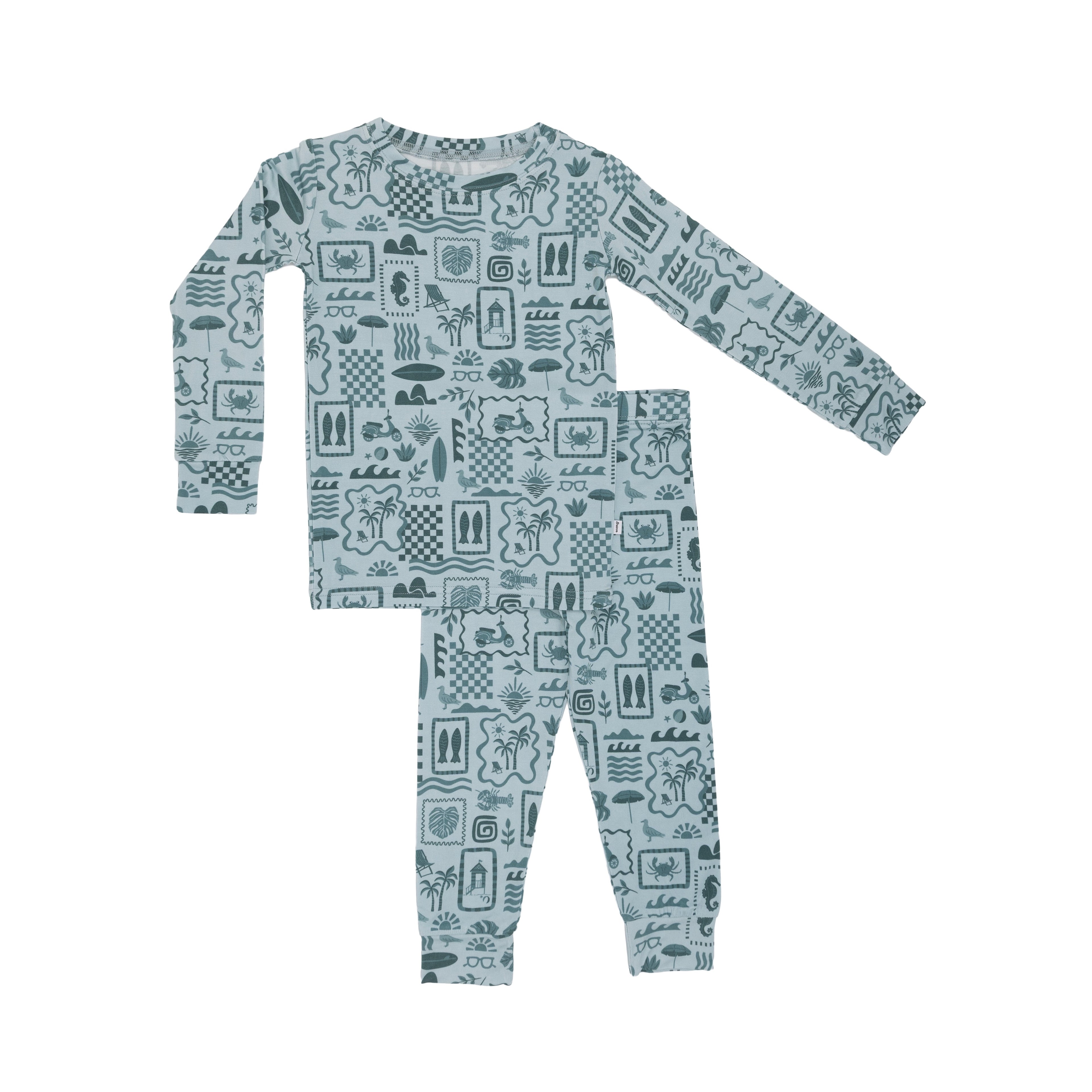 Children's pajama set with summer patterns on a white background