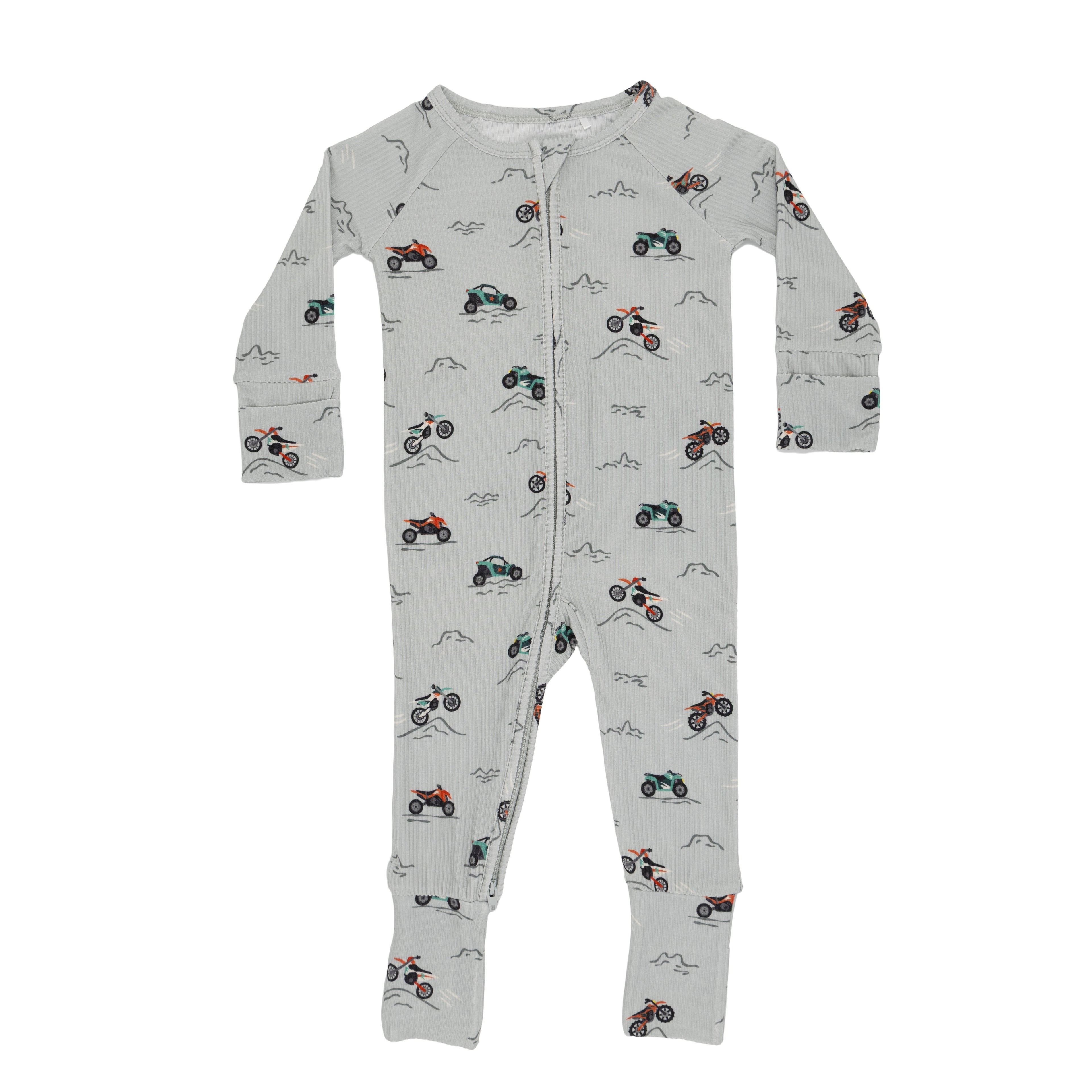 Baby long sleeve onesie with vehicle patterns on a white background