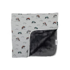 Blanket with motorcycle pattern on one side and solid color on the other, on a white background