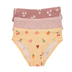 Set of three children's underwear with floral, girly, and striped patterns on a white background.