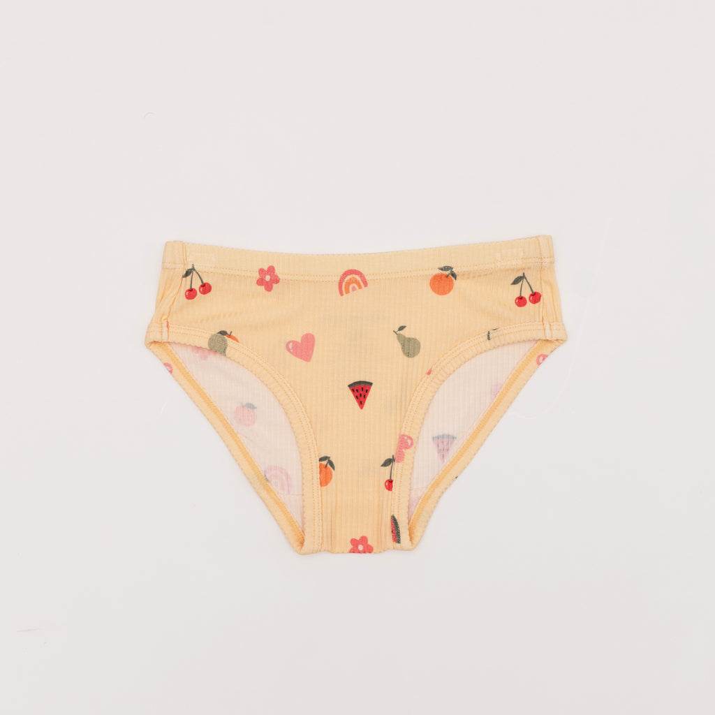 Yellow underwear with fruit pattern on a white background