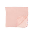 Pink striped blanket on a white background