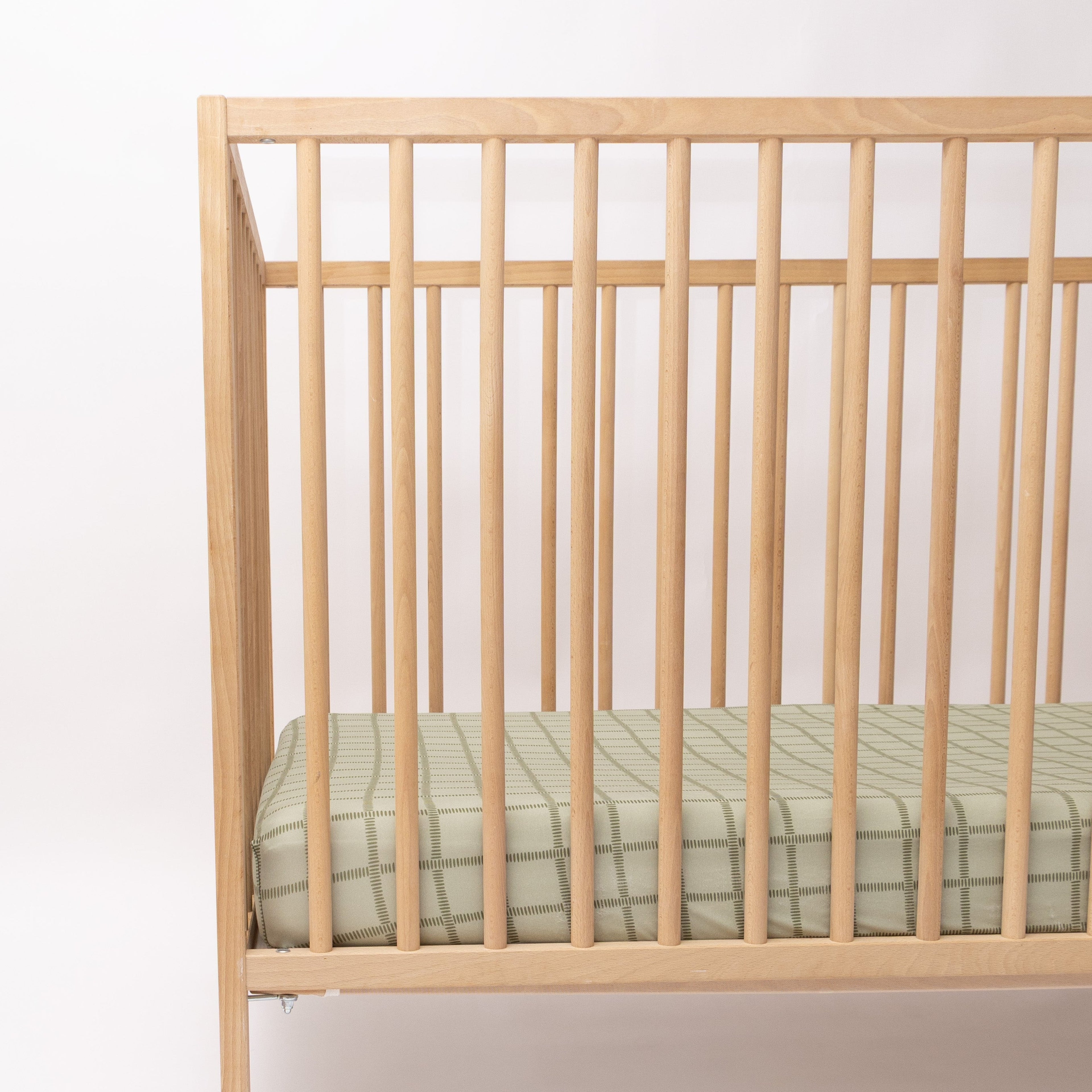 Grid Sage Green Crib Sheet