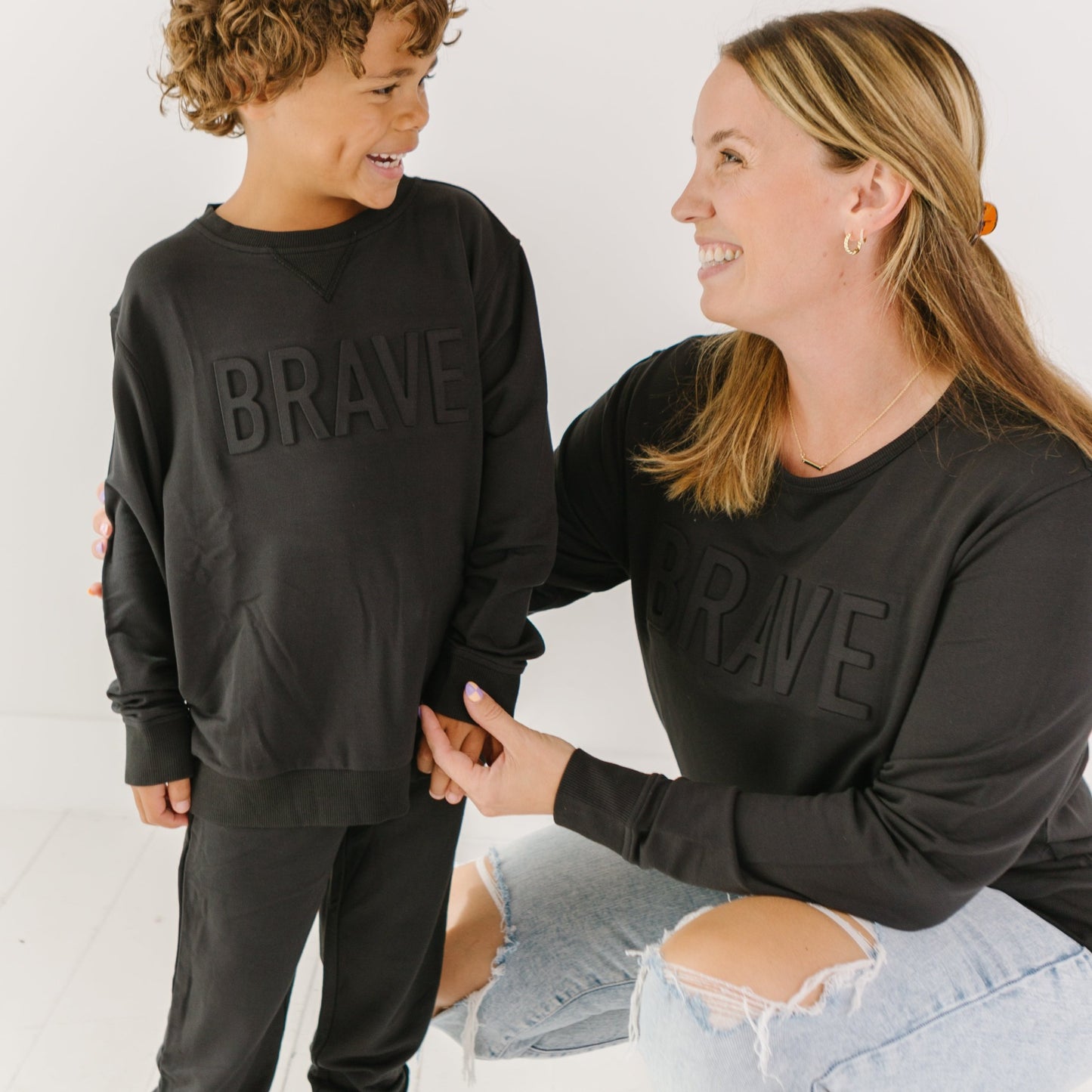 Jet Black with Embossed Brave Women's French Terry Pullover