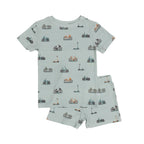 Children's pajama shorts set with bike and scooter pattern on a light blue background