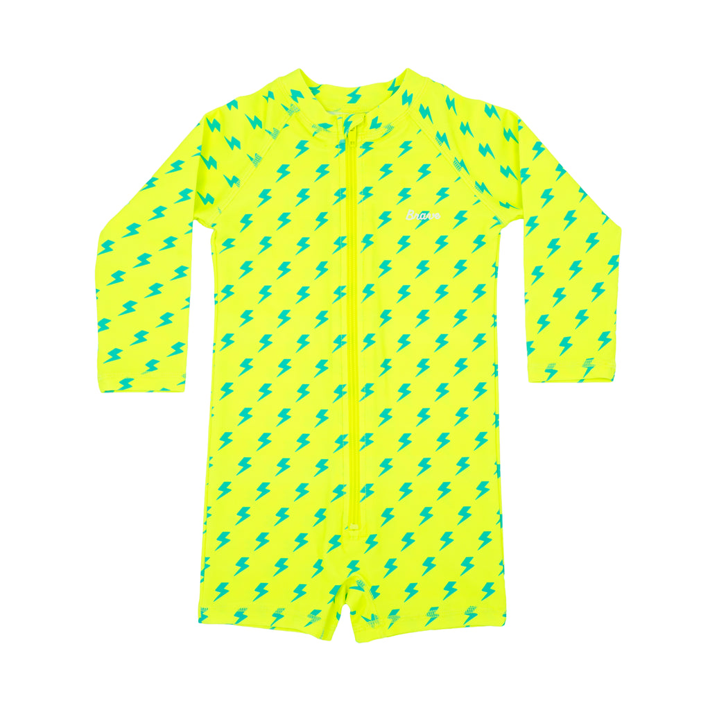 Yellow boy swimsuit with blue lightning bolt pattern on a white background
