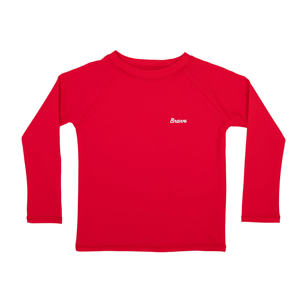Red long-sleeve rash guard with 'Brave' logo on a white background