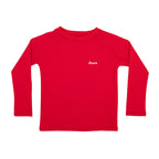 Red long-sleeve rash guard with 'Brave' logo on a white background