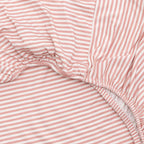 Close-up of pink and white striped fabric 