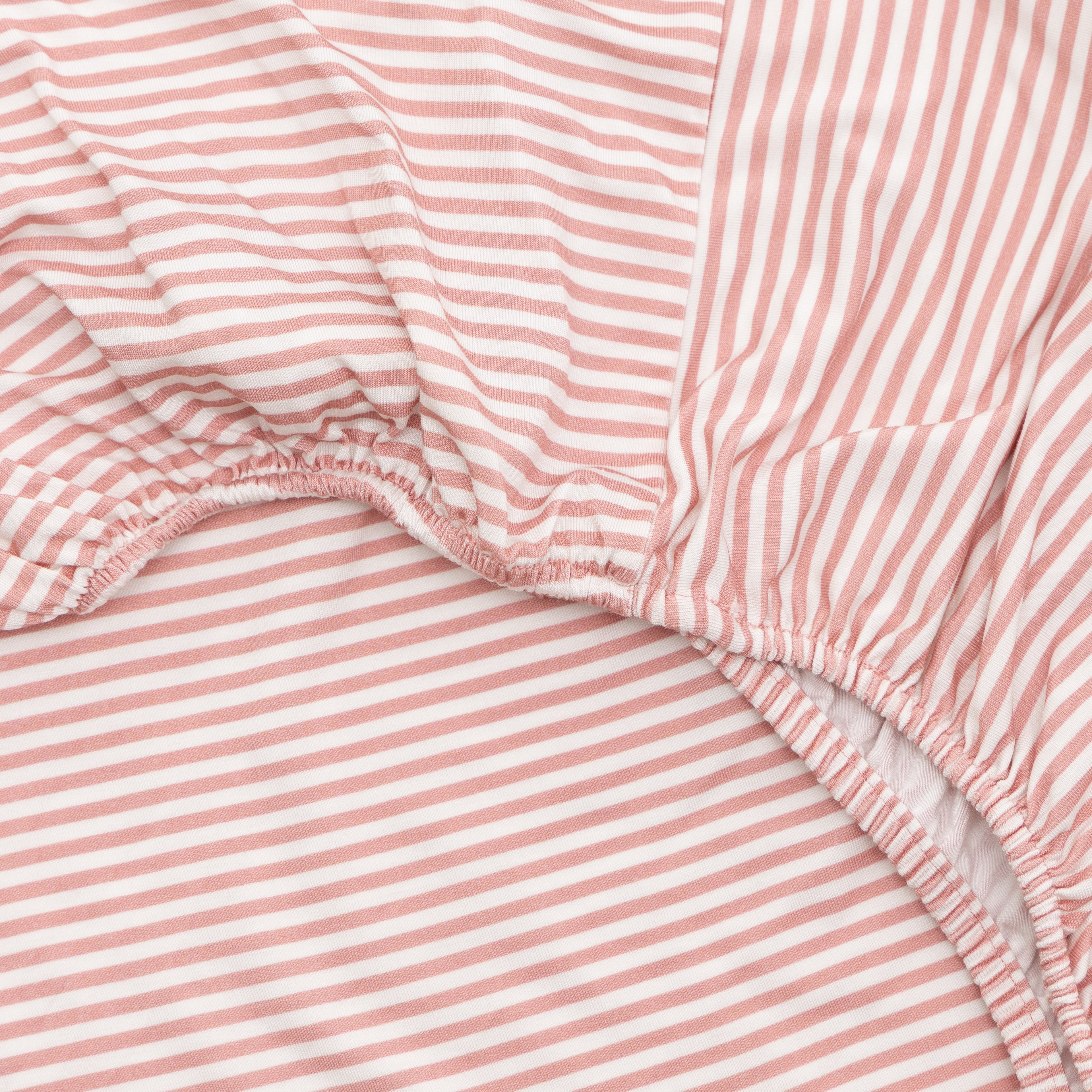 Close-up of pink and white striped fabric 