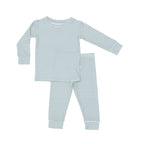 Blue and white striped pajama set with top and pants on a white background