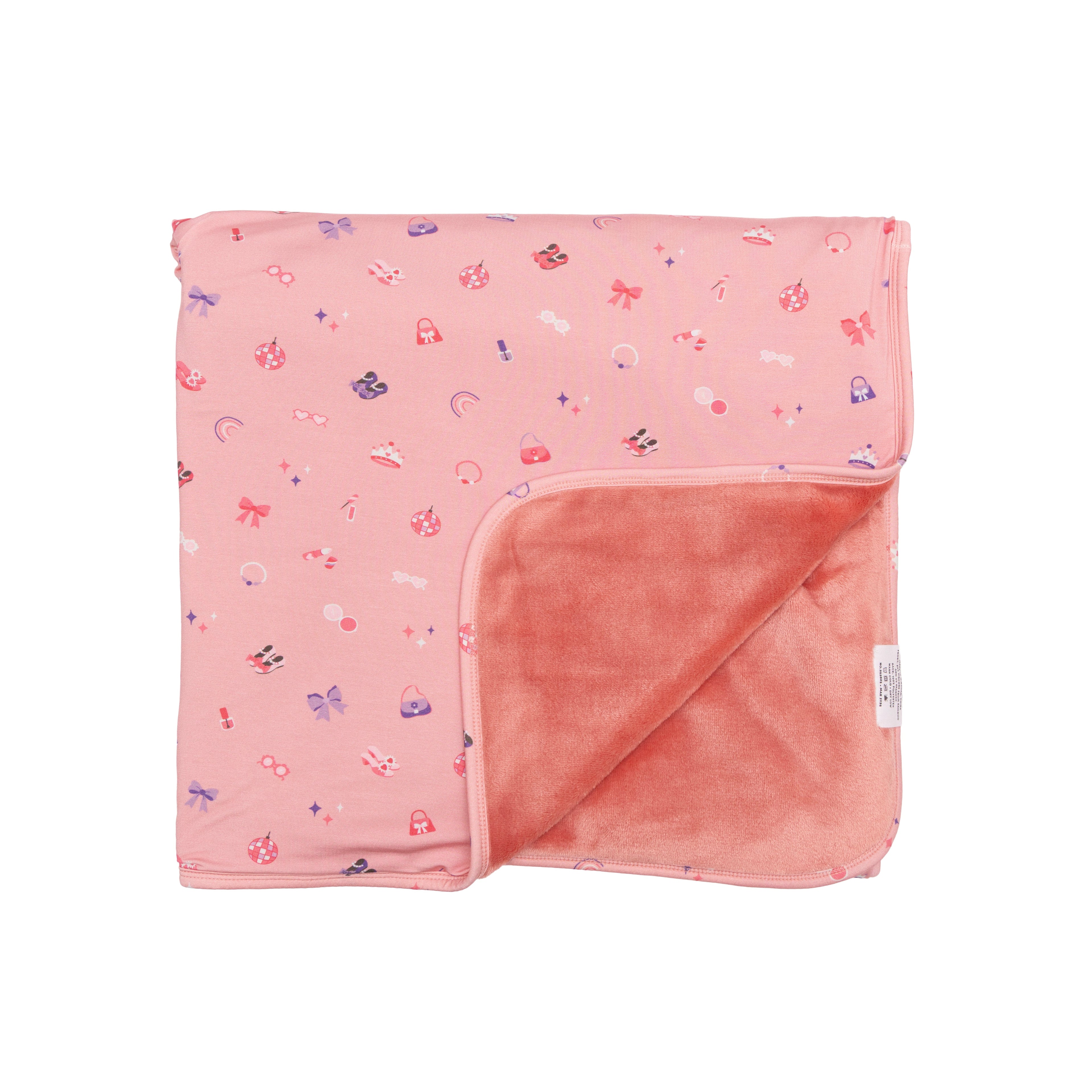 Pink baby blanket with small girly patterns on a white background