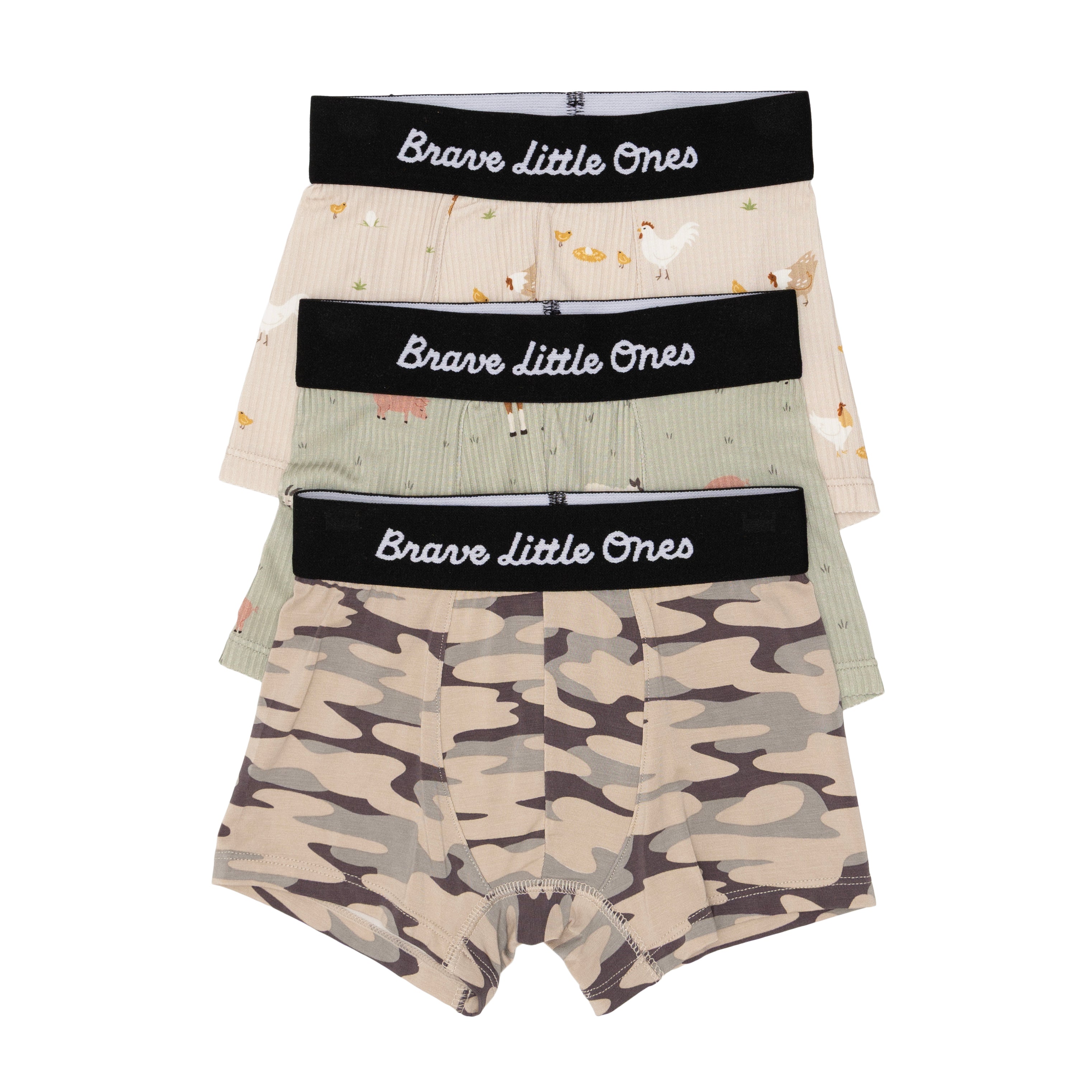 Three pairs of children's underwear with camouflage, farm animals and chickens designs, with 'Brave Little Ones' branding on a white background.