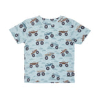 Children's light blue t-shirt with monster truck pattern on a white background