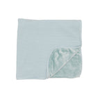 Folded baby blanket with striped pattern on a white background