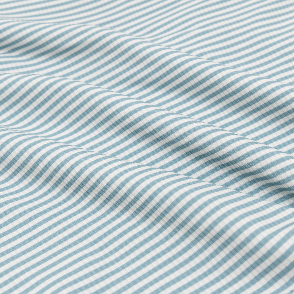 Close-up of blue and white striped fabric