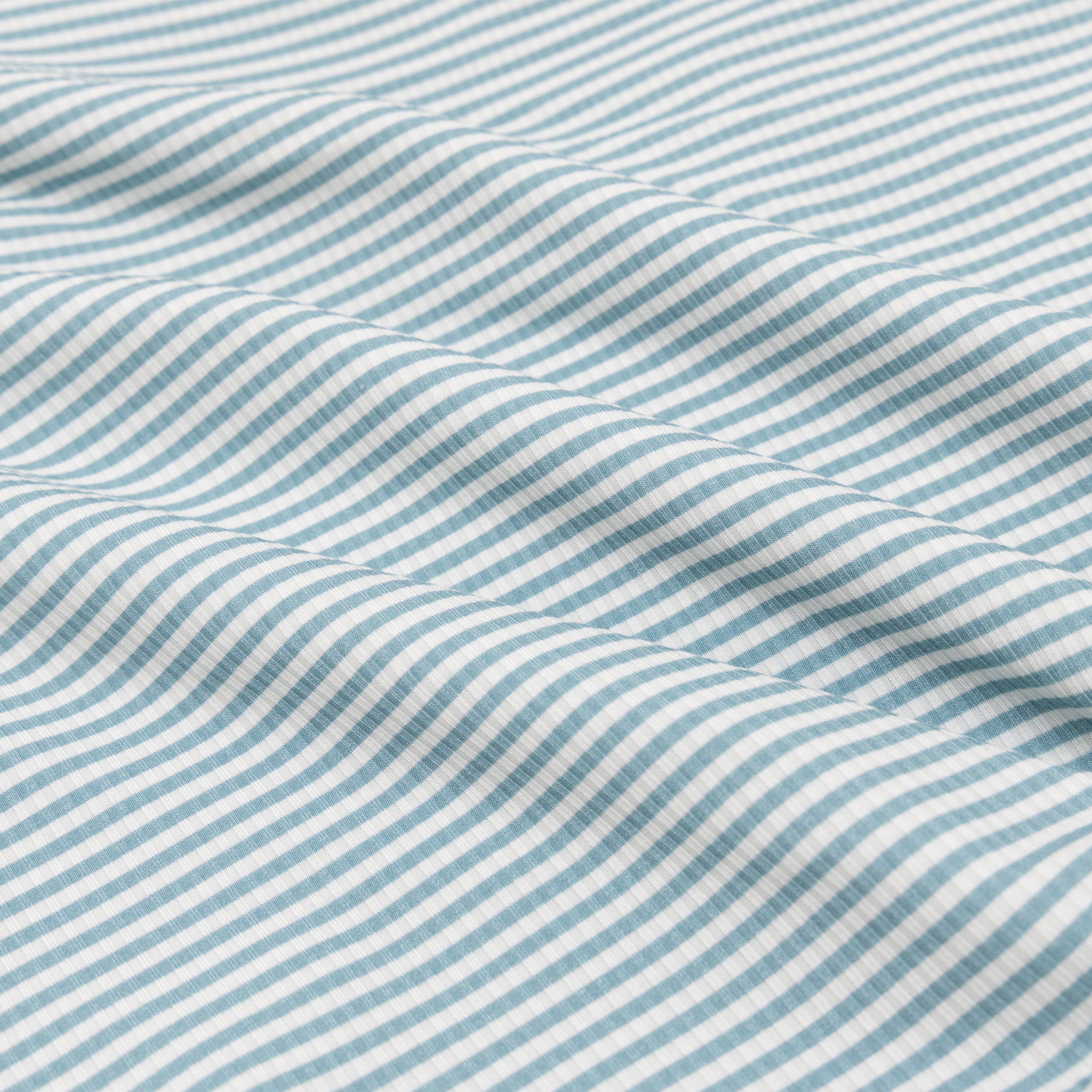 Close-up of blue and white striped fabric