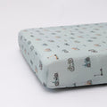 Fitted sheet with bicycle pattern on a light blue background