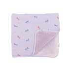 Light purple baby blanket with colorful unicorn patterns on a white background