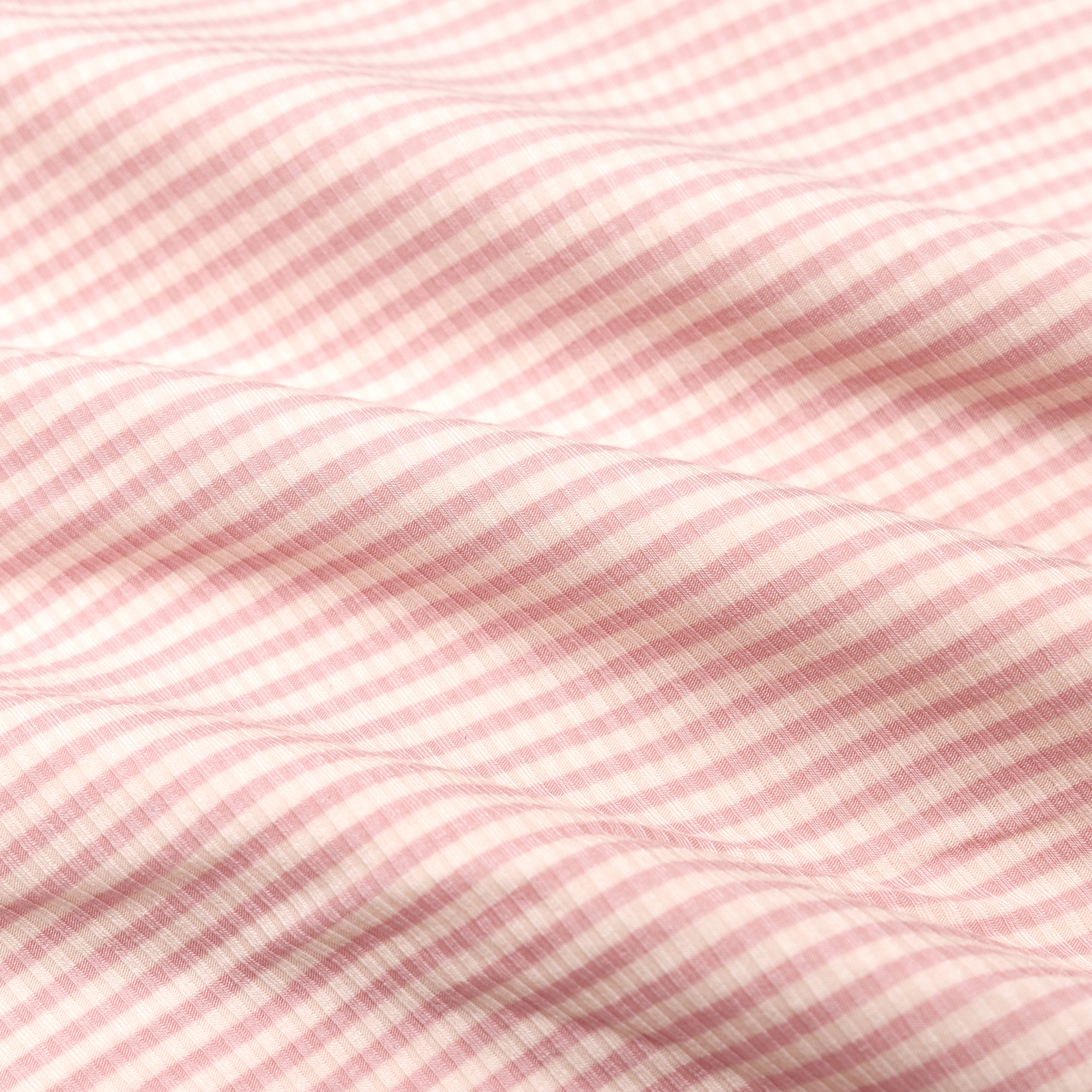 Close-up of pink and white striped fabric