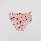 Pink underwear with strawberry pattern on a white background