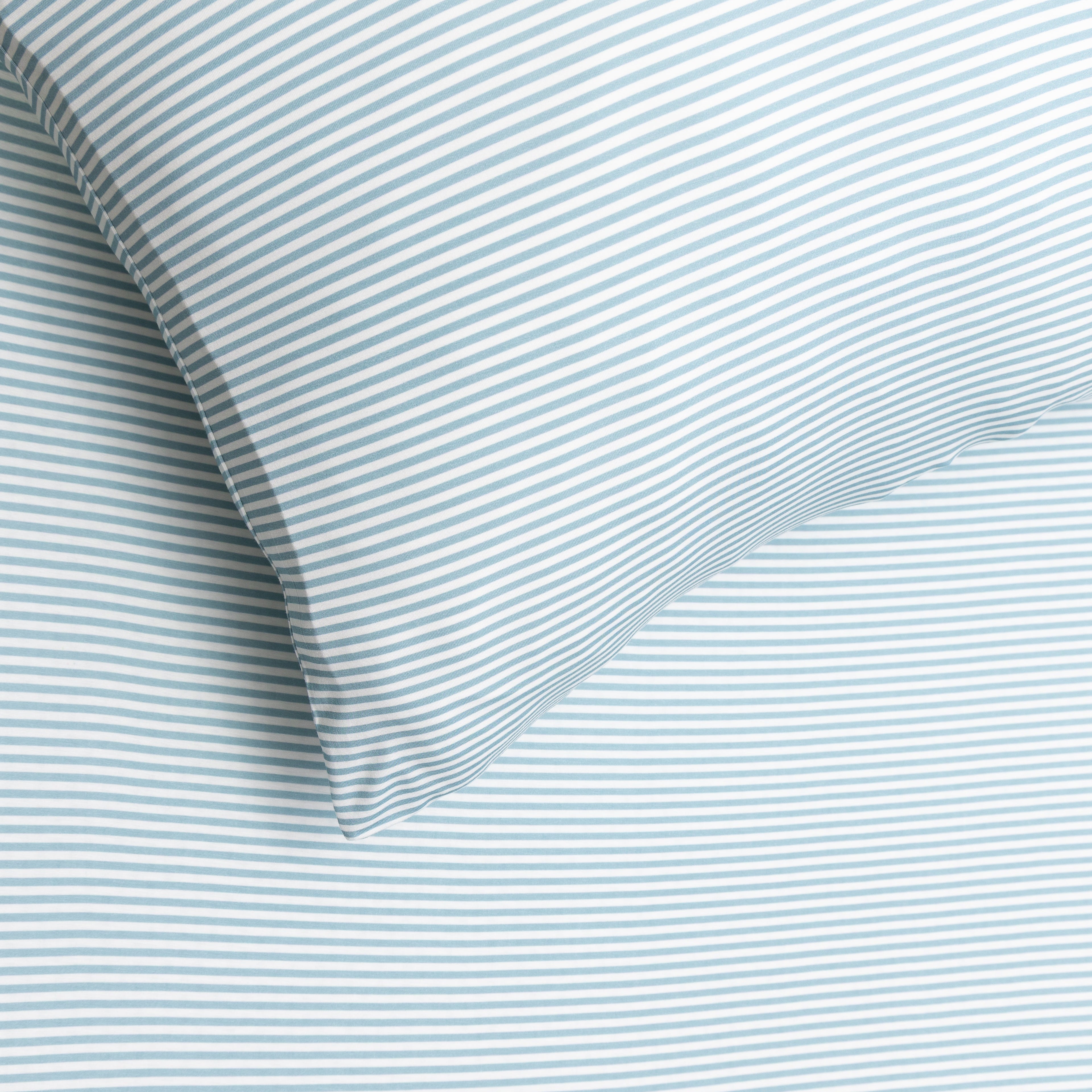 Close-up of light blue and white striped fabric