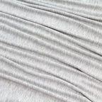 Close up of a gray heathered fabric