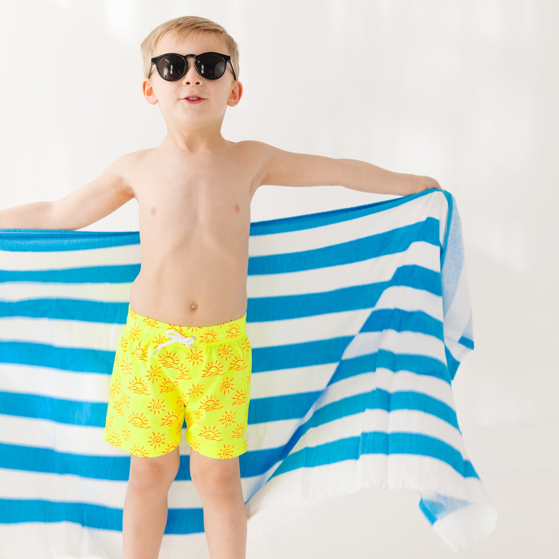 Neon Yellow Suns Swim Trunks