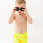 Neon Yellow Suns Swim Trunks