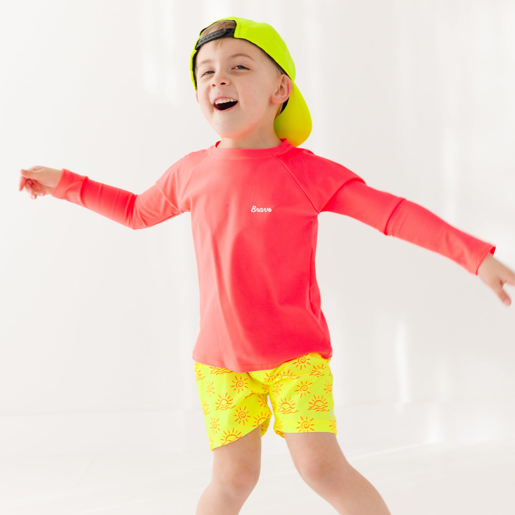 Neon Yellow Suns Swim Trunks