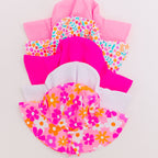 Set of colorful sun hats on a plain background