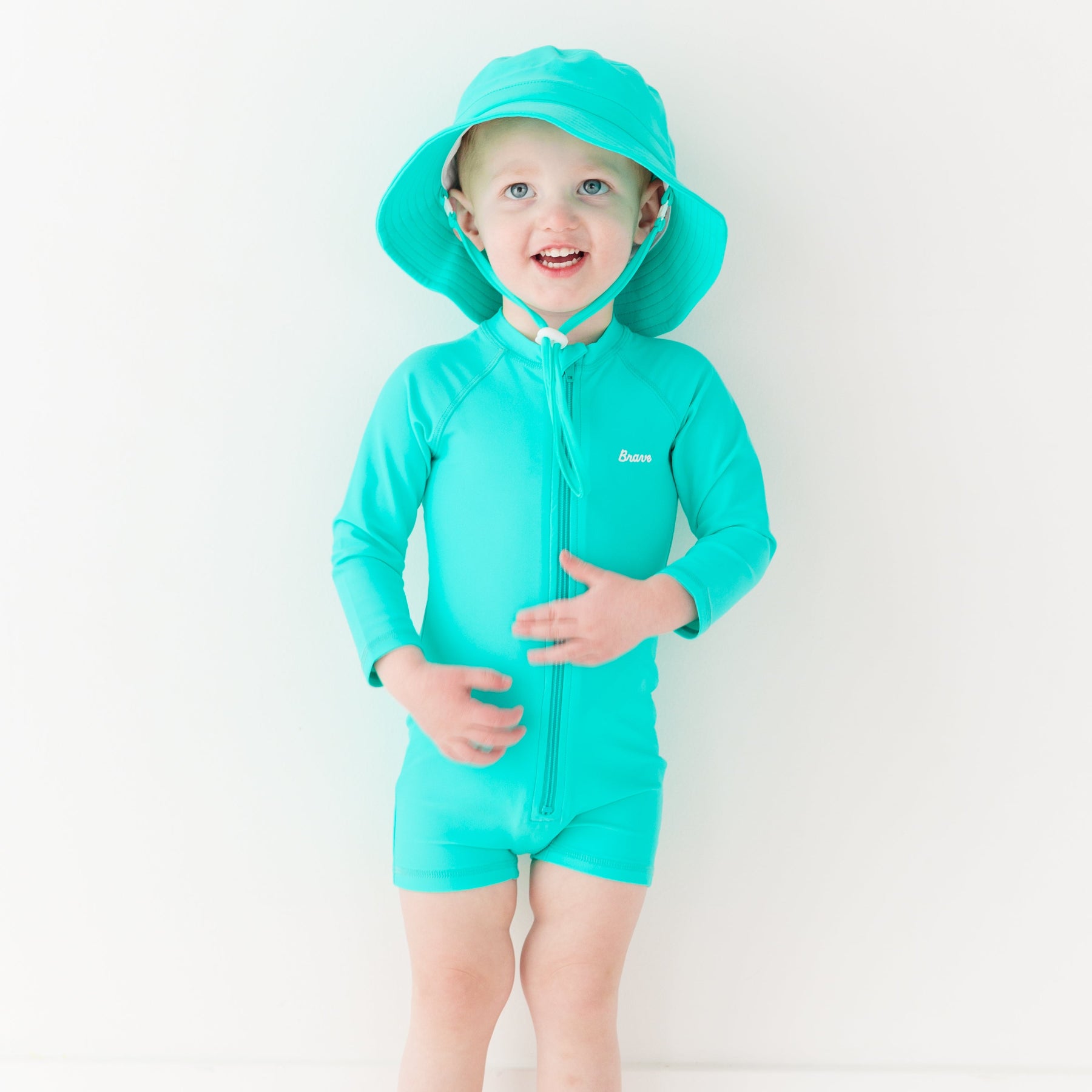Neon Turquoise Long Sleeve Rash Guard Boy Shortie