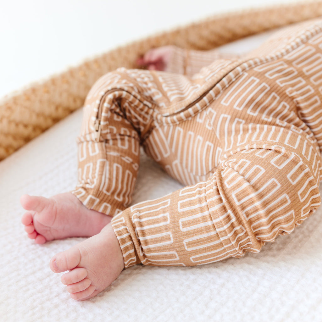 Neutral Lines Small Ribbed Zip Romper