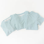 Blue and white striped pajama sets on a white background