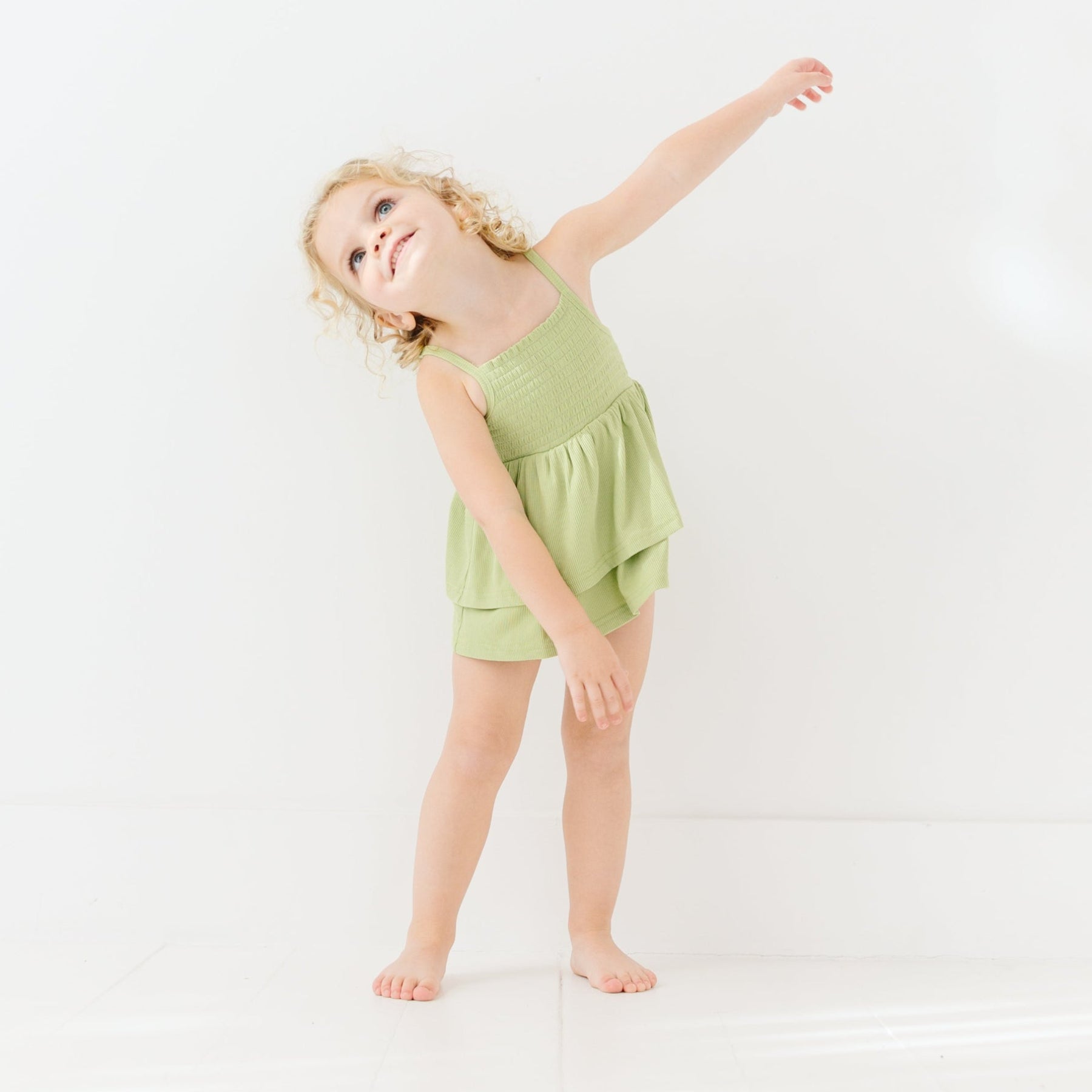 Tarragon Green Small Ribbed Ruffle Romper 0-3M Tarragon Green Small Ribbed Ruffle Romper 0-3M