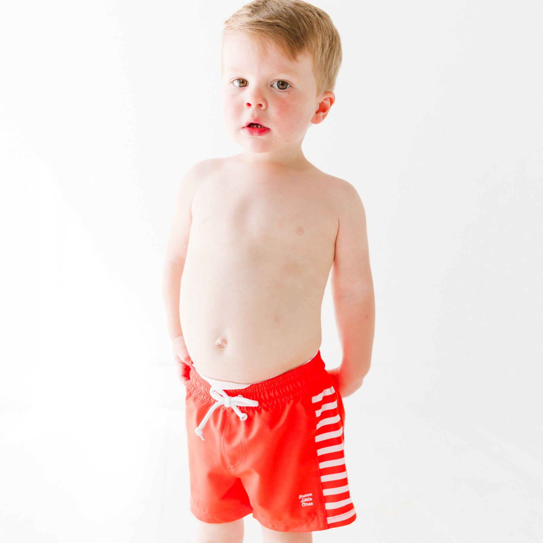 Neon Coral Stripe Swim Trunks