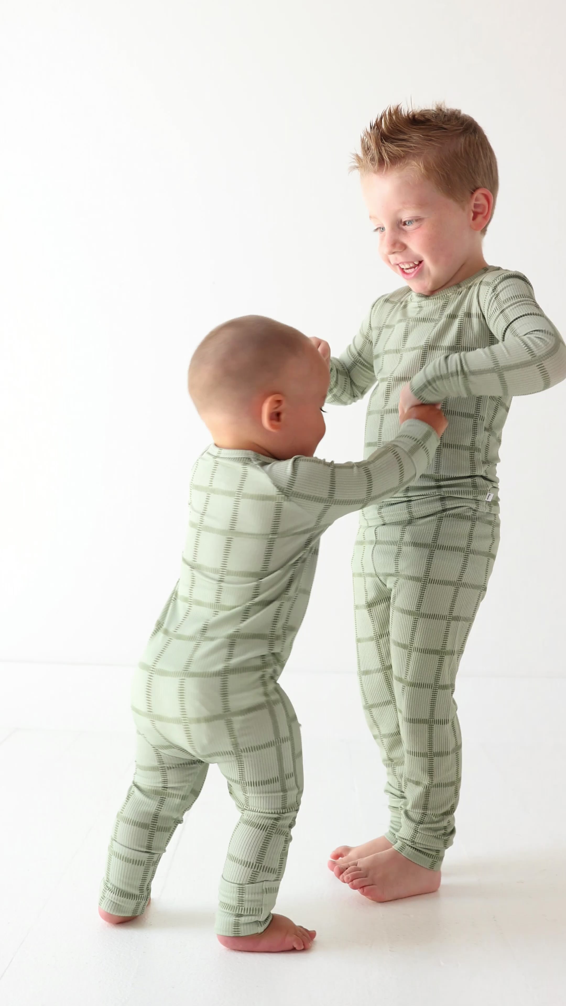 Grid Sage Green Small Ribbed Zip Romper