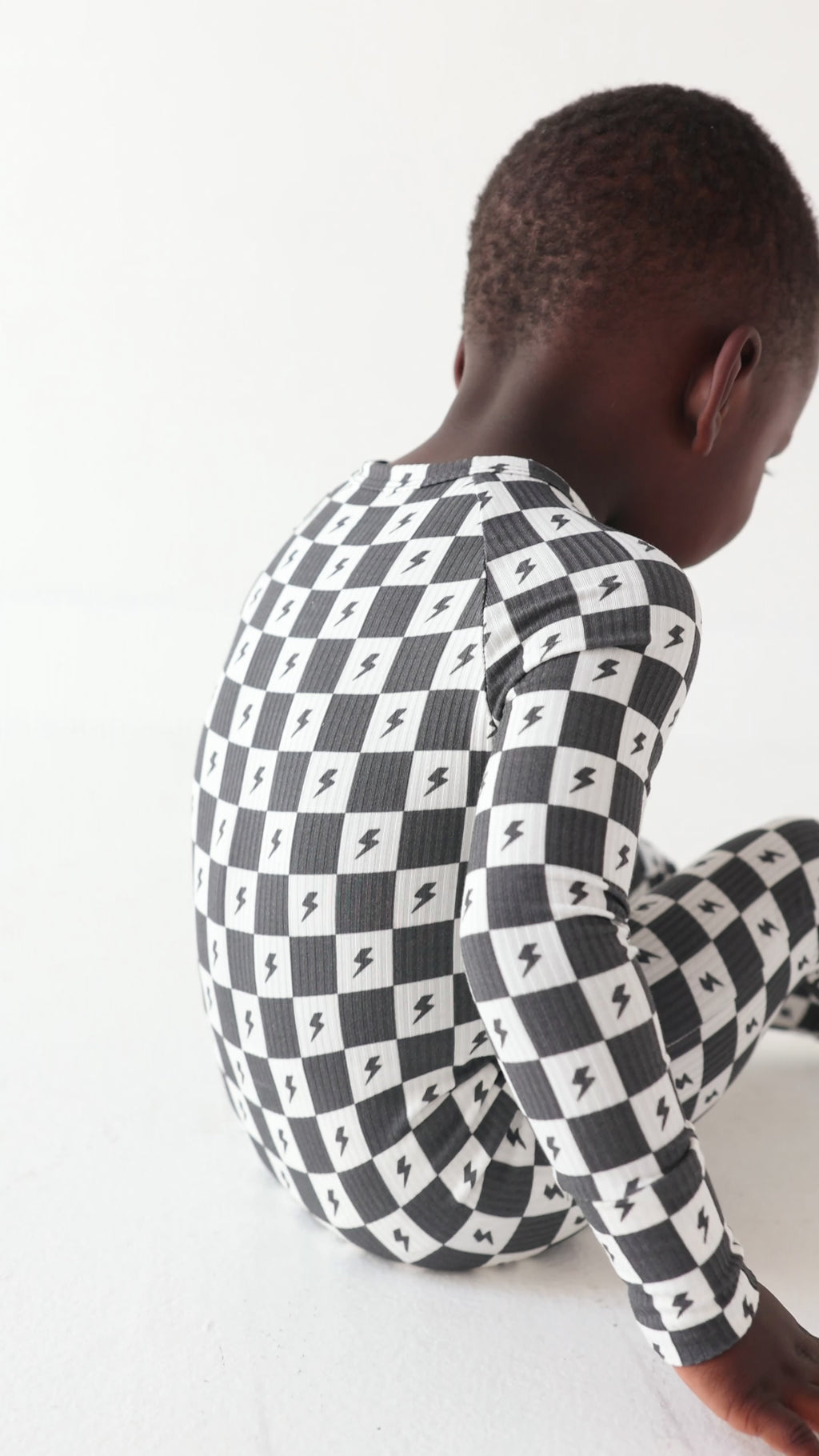 Checkered Lightning Bolt Small Ribbed Zip Romper