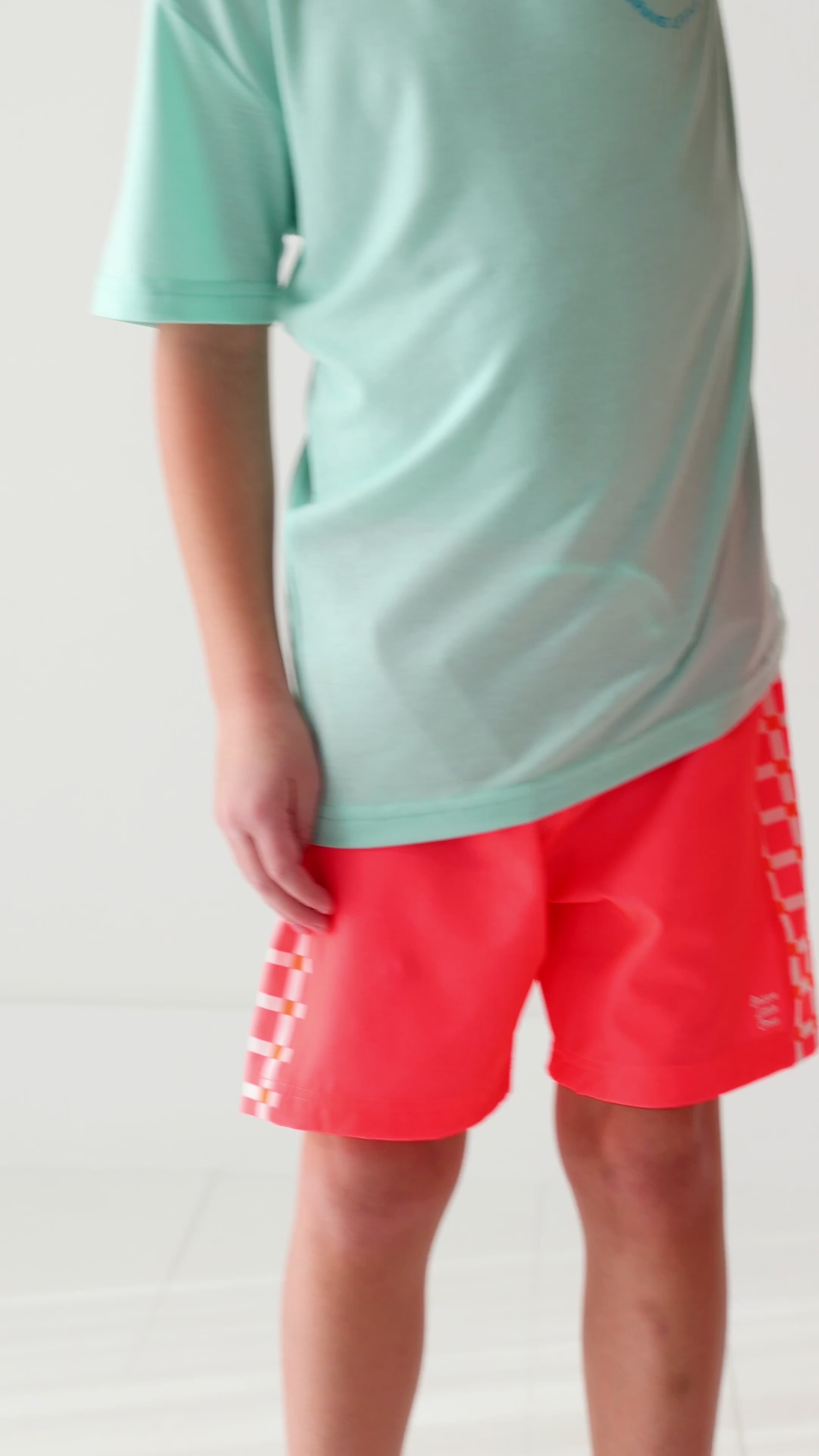 Neon Coral With Squares Swim Trunks